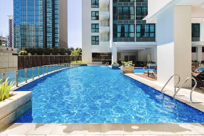 Luxestaysmnl Coastal Chic Netflx 380Mbps Pool Bgc Манила Экстерьер фото